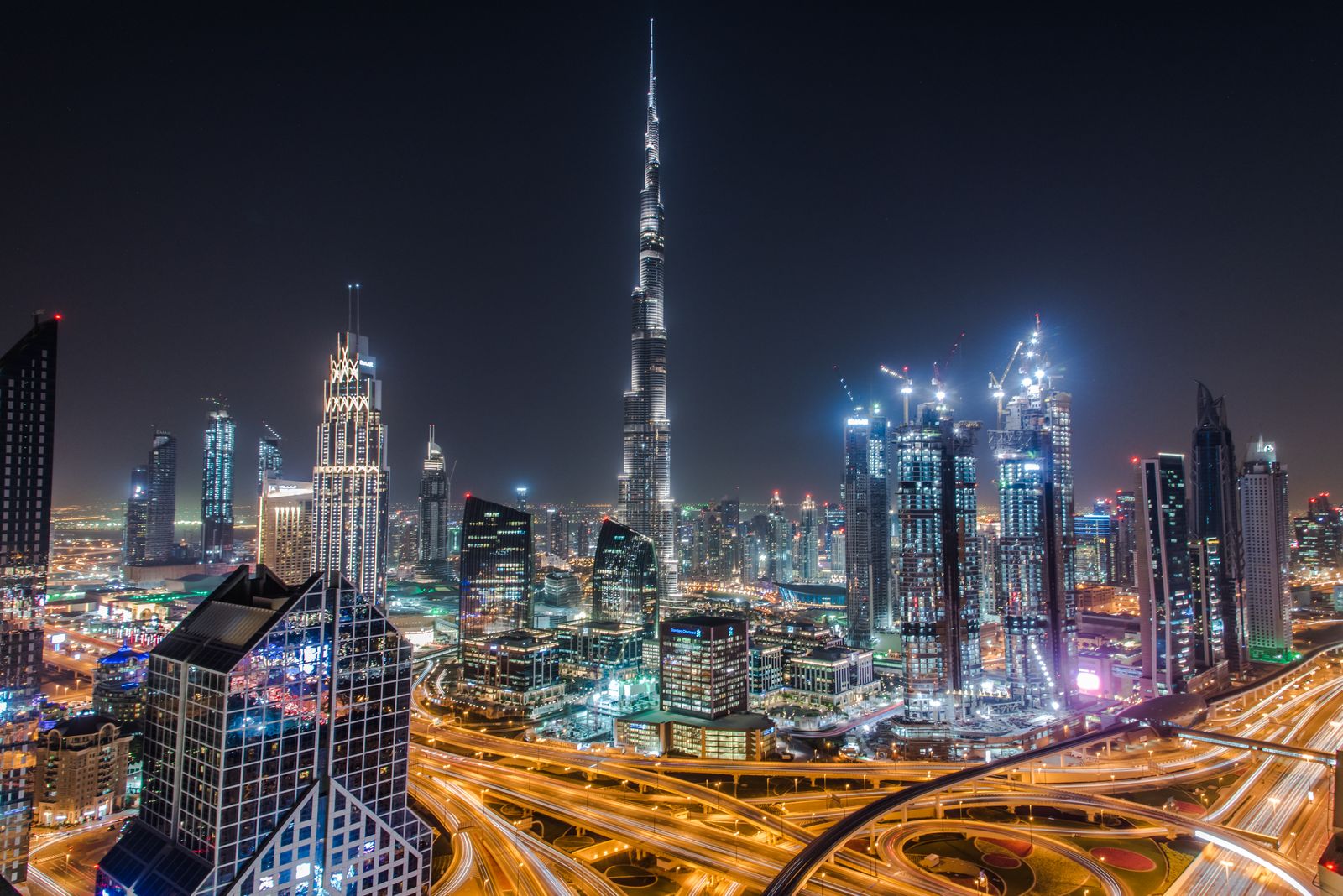 Dubai skyline at dusk with the Burj Khalifa rising above Downtown